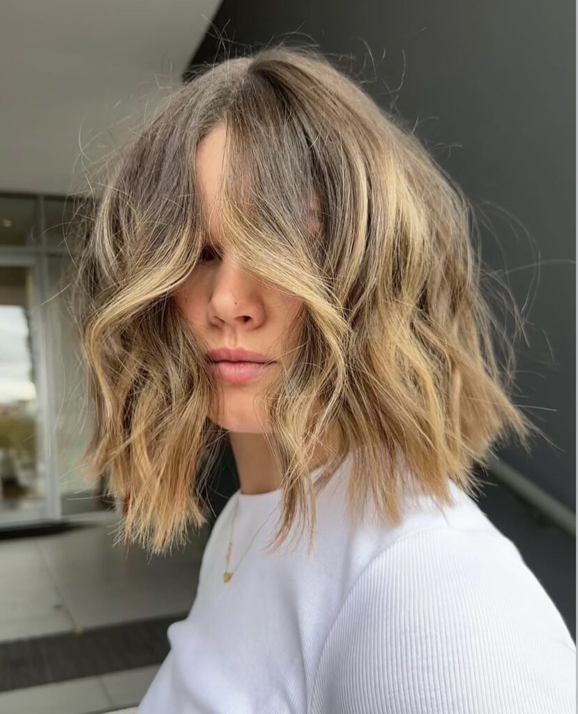 Medium length haircut with soft layers and a smooth blow dry finish, Circles of Hair Perth