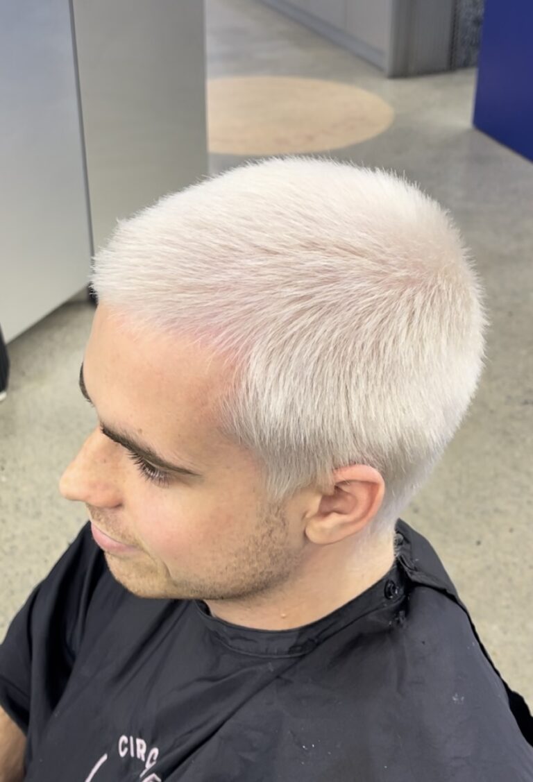 Clean one-length head shave finish at Circles of Hair Perth