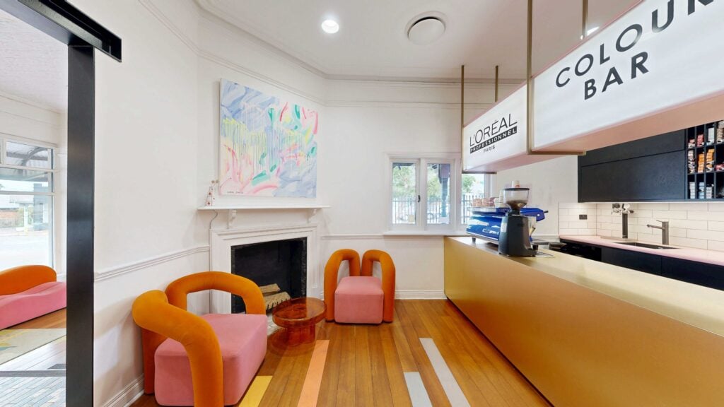 The heritage fireplace and seating at Circles of Hair Fitzgerald