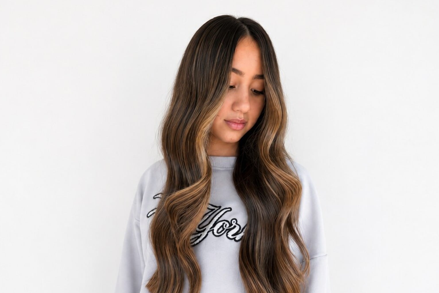 Hand-painted balayage on long brunette hair with soft blonde ends, Circles of Hair Perth